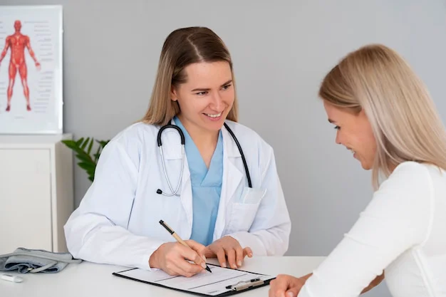 A doctor explaining a peptide therapy treatment plan to a patient during a consultation session.