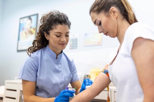 A nurse conducting bloodwork as part of the first peptide therapy session for personalized treatment planning.