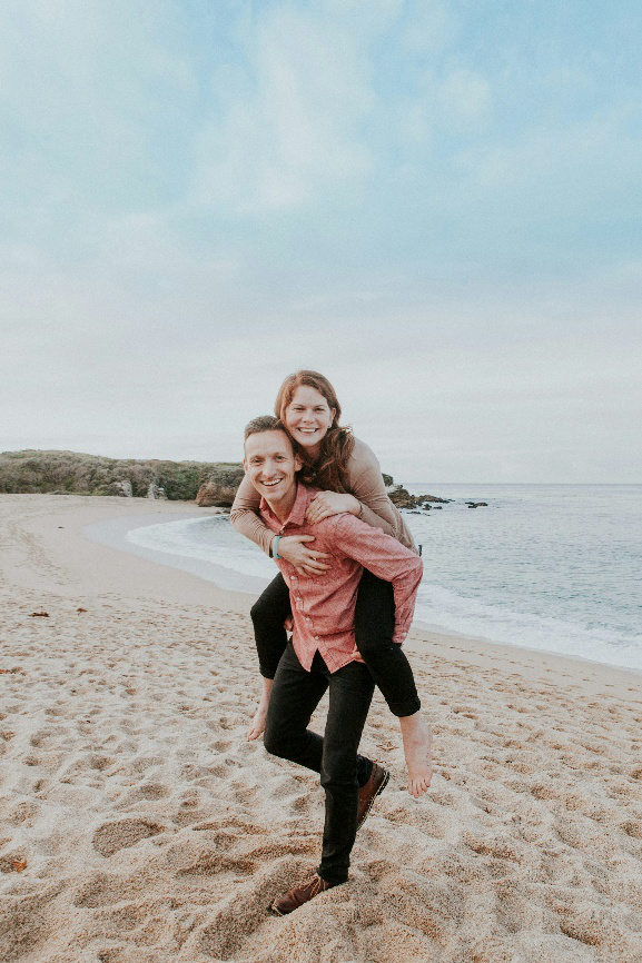  A happy couple enjoying an active day at the beach.