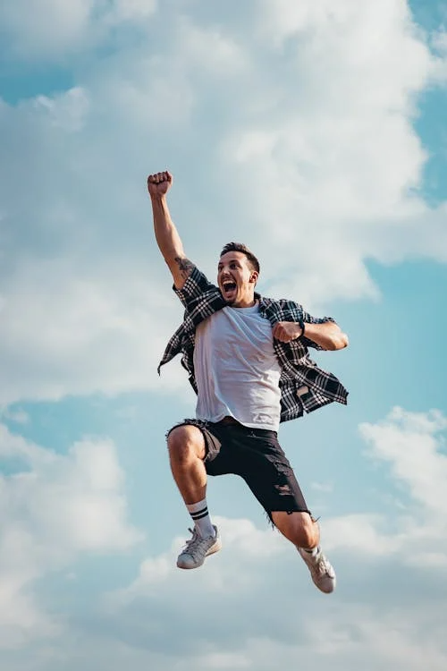 An image of a man jumping  