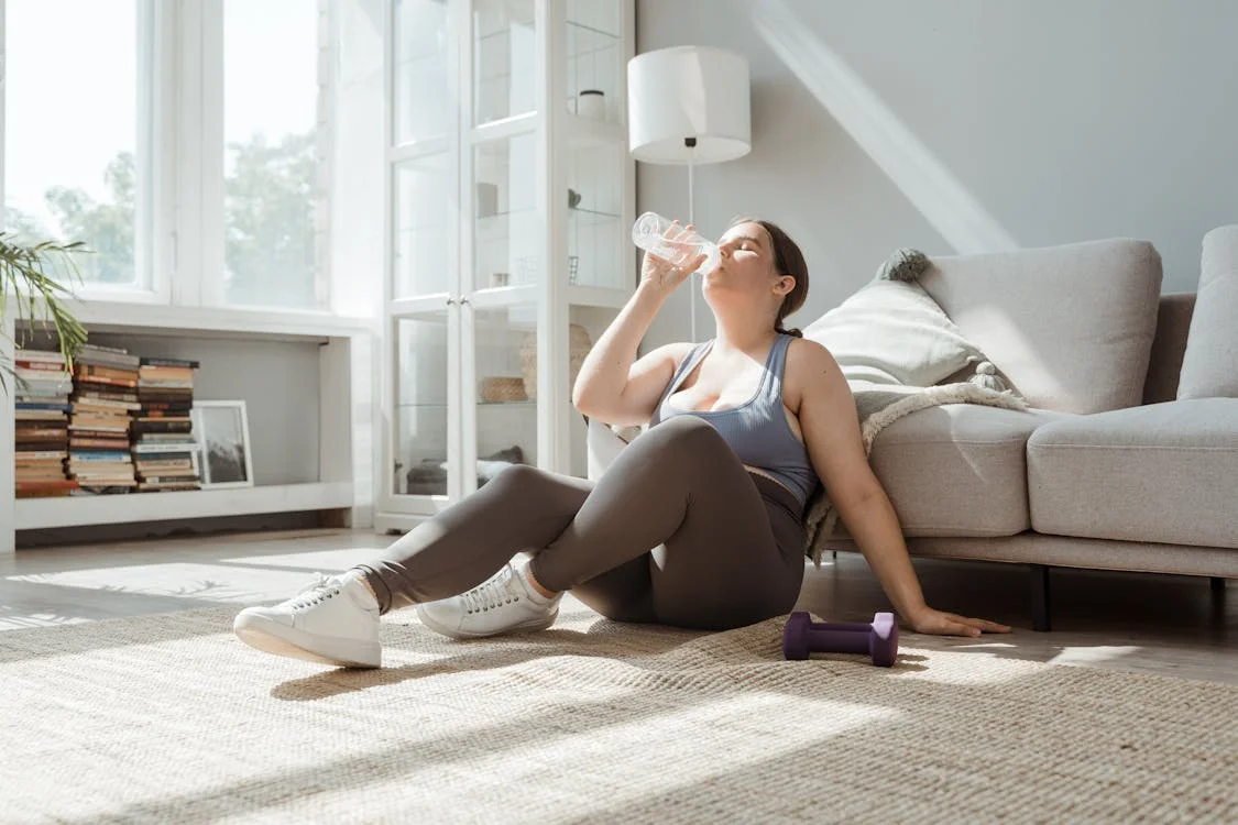 An image of a woman drinking water