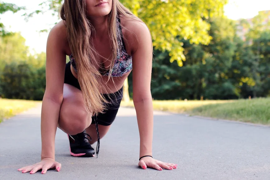 An image of a woman working out outdoors