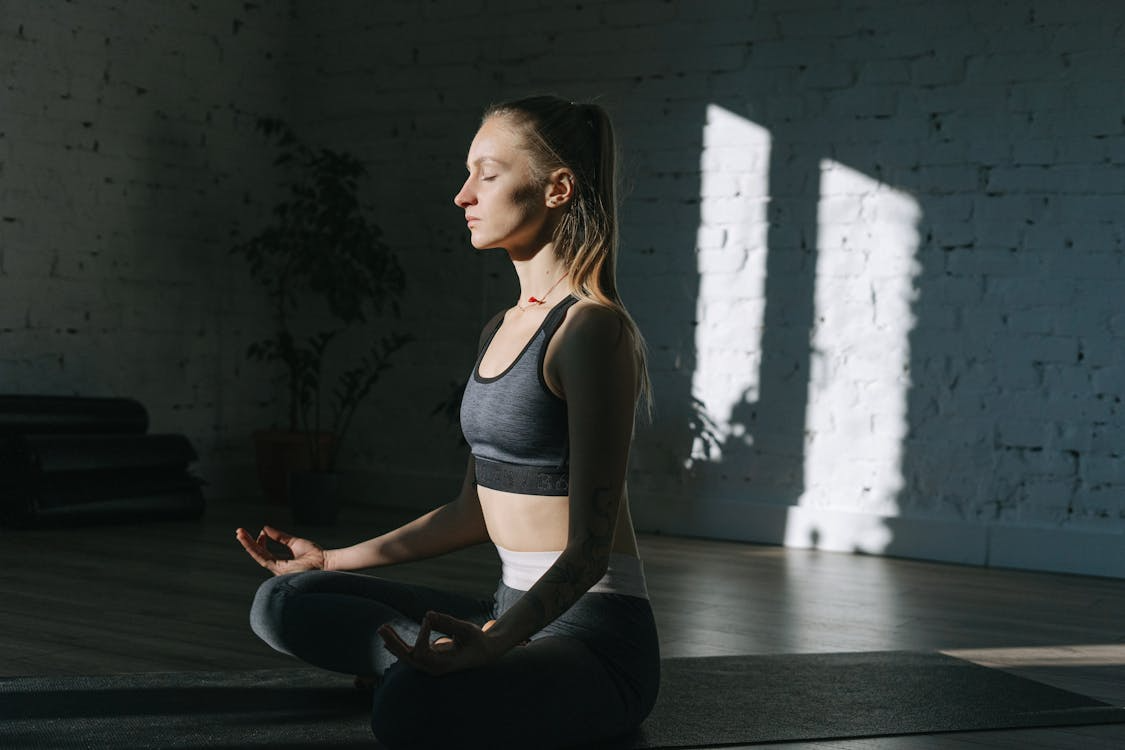 An image of a woman meditating