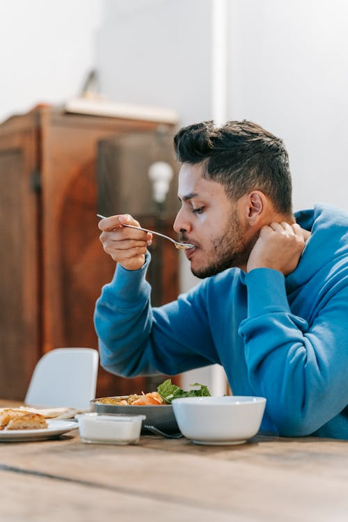 An image of a man eating