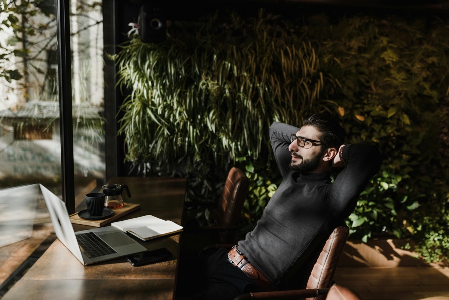 Adult relaxing in a calm indoor setting after a productive day