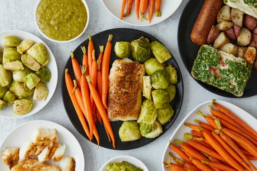 Plate with lean protein and vegetables arranged in a healthy meal