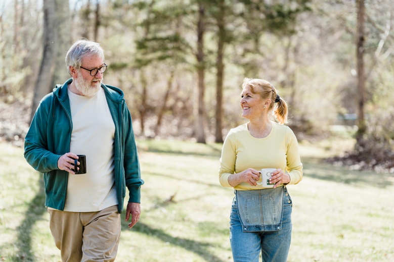 Active adult walking outdoors in a bright natural setting