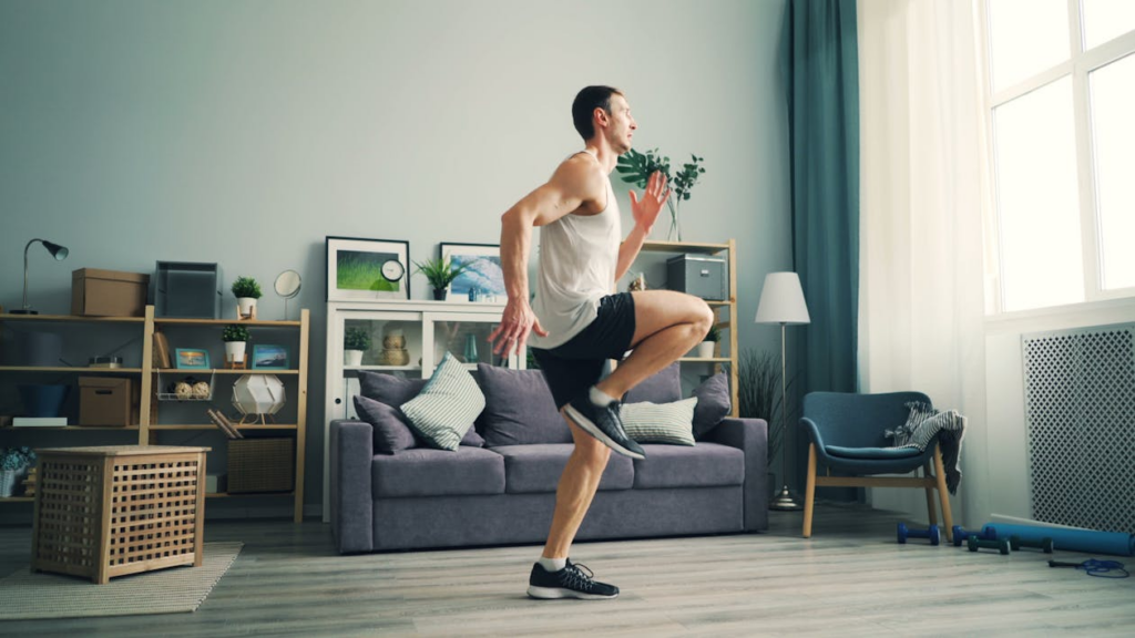 An image of a man working out at home