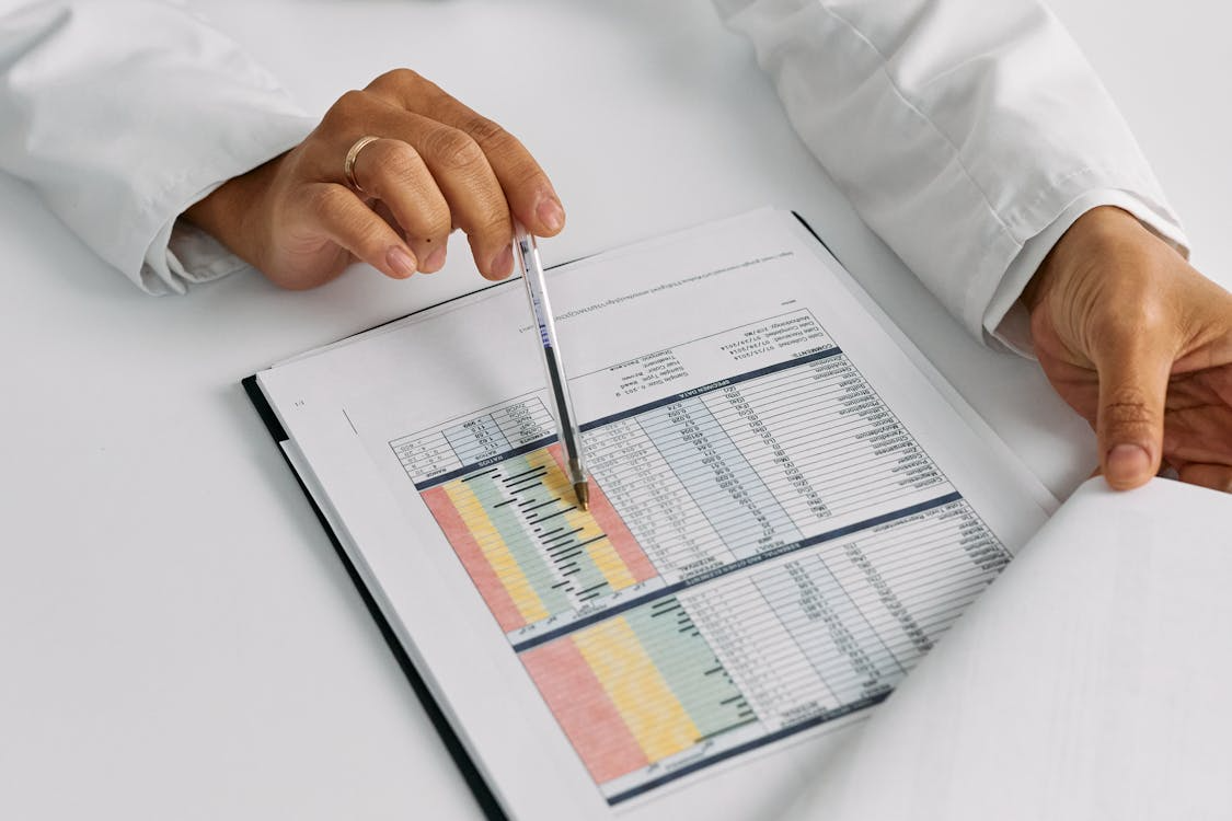 a person reviewing health metrics with a medical professional