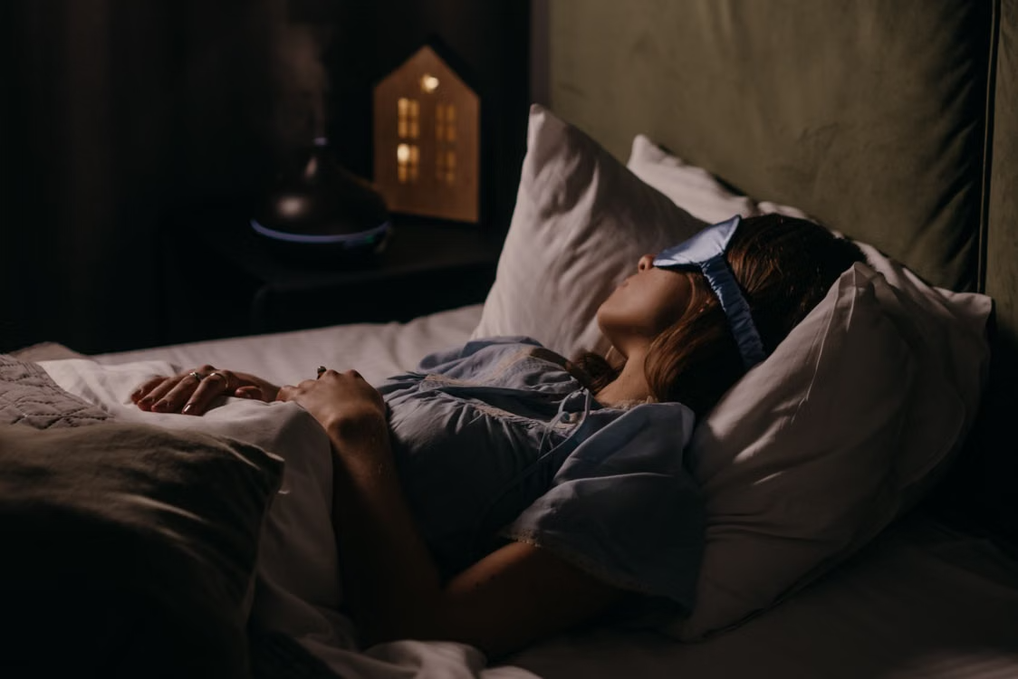 A woman sleeping in bed
